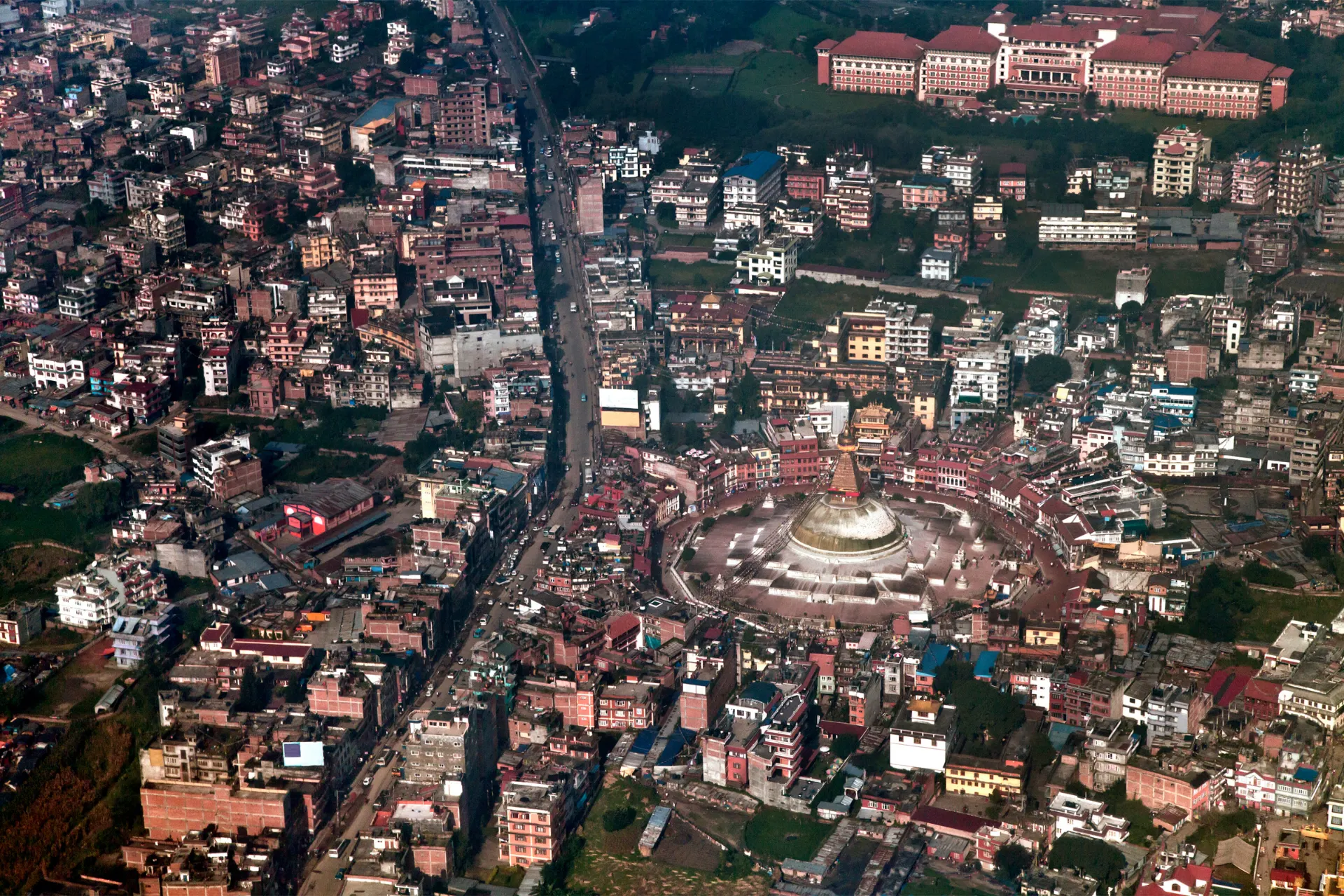 Everest helicopter tour departing from Kathmandu — scenic flight over Nepalese foothills